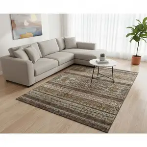 Photo of Chocolate Copper And Ivory Southwestern Washable Area Rug With UV Protection