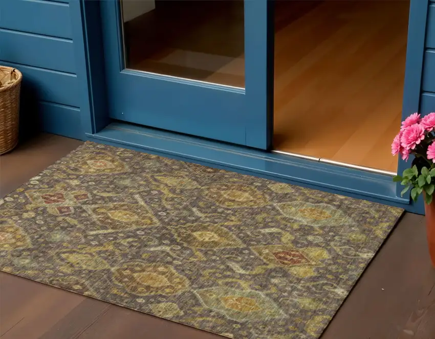 Chocolate Gold And Burgundy Ikat Washable Indoor Outdoor Area Rug Photo 1