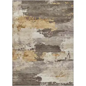 Photo of Chocolate Gold And Ivory Abstract Washable Indoor Outdoor Area Rug