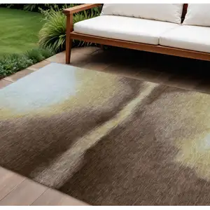 Photo of Chocolate Gold And Plum Abstract Washable Indoor Outdoor Area Rug