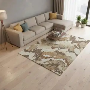 Photo of Chocolate Ivory And Beige Abstract Washable Area Rug With UV Protection