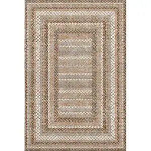 Photo of Chocolate Ivory And Beige Geometric Washable Area Rug With UV Protection