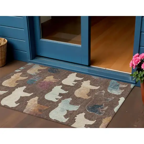 Chocolate Ivory And Blue Animal Print Washable Indoor Outdoor Area Rug Photo 1