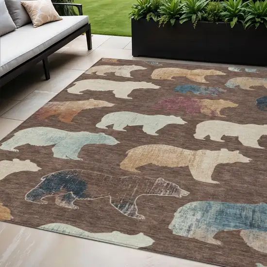 Chocolate Ivory And Blue Animal Print Washable Indoor Outdoor Area Rug Photo 1