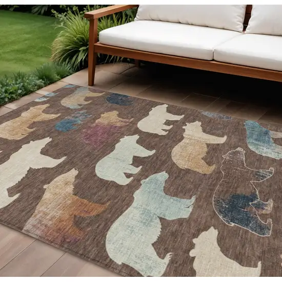 Chocolate Ivory And Blue Animal Print Washable Indoor Outdoor Area Rug Photo 1