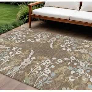 Photo of Chocolate Ivory And Blue Floral Washable Indoor Outdoor Area Rug