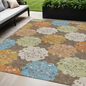 Photo of Chocolate Ivory And Copper Quatrefoil Washable Indoor Outdoor Area Rug