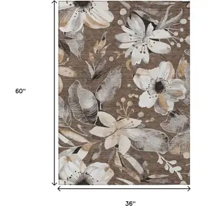Photo of Chocolate Ivory And Wheat Floral Washable Indoor Outdoor Area Rug
