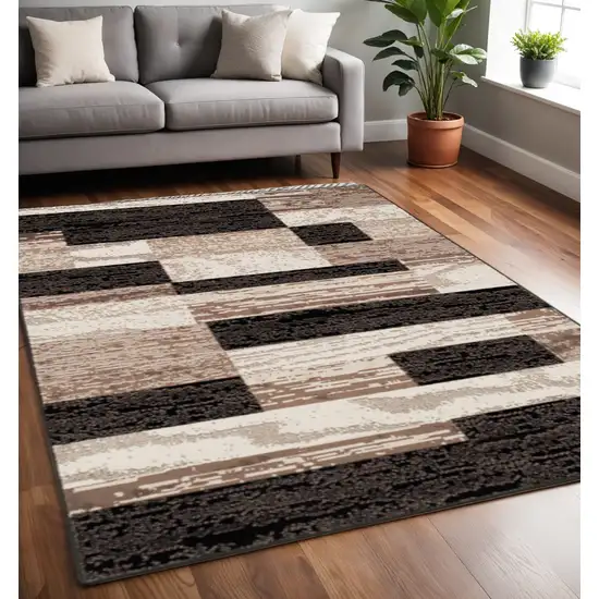 Black Brown And Beige Patchwork Area Rug Photo 1