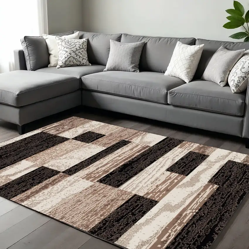 Black Brown And Beige Patchwork Area Rug Photo 1
