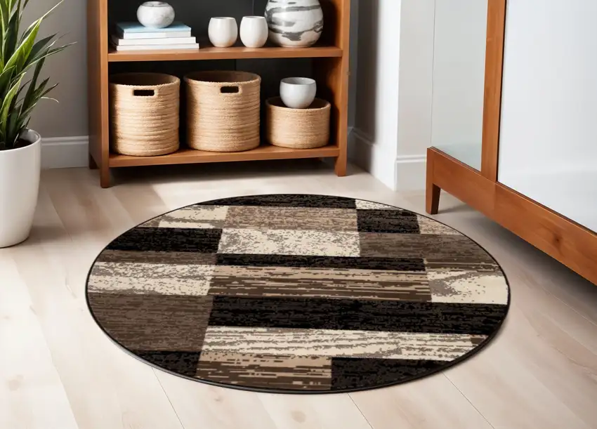 5' Black Brown And Beige Patchwork Round Rug Photo 1