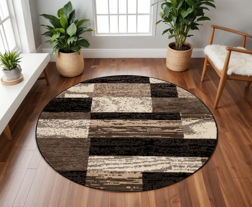 8' Black Brown And Beige Patchwork Round Rug Photo 1