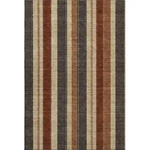 Photo of Chocolate Rust And Beige Striped Washable Area Rug With UV Protection