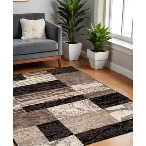 Photo of Chocolate Square Patchwork Power Loom Stain Resistant Area Rug