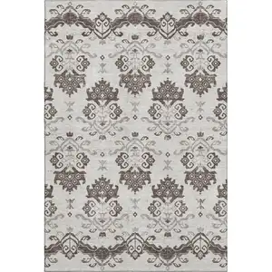 Photo of Chocolate Taupe And Beige Medallion Washable Area Rug With UV Protection