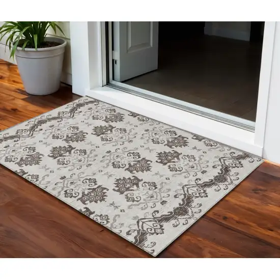 Chocolate Taupe And Beige Oriental Washable Indoor Outdoor Area Rug Photo 1