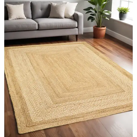 Classic Tan Bordered Area Rug Photo 1