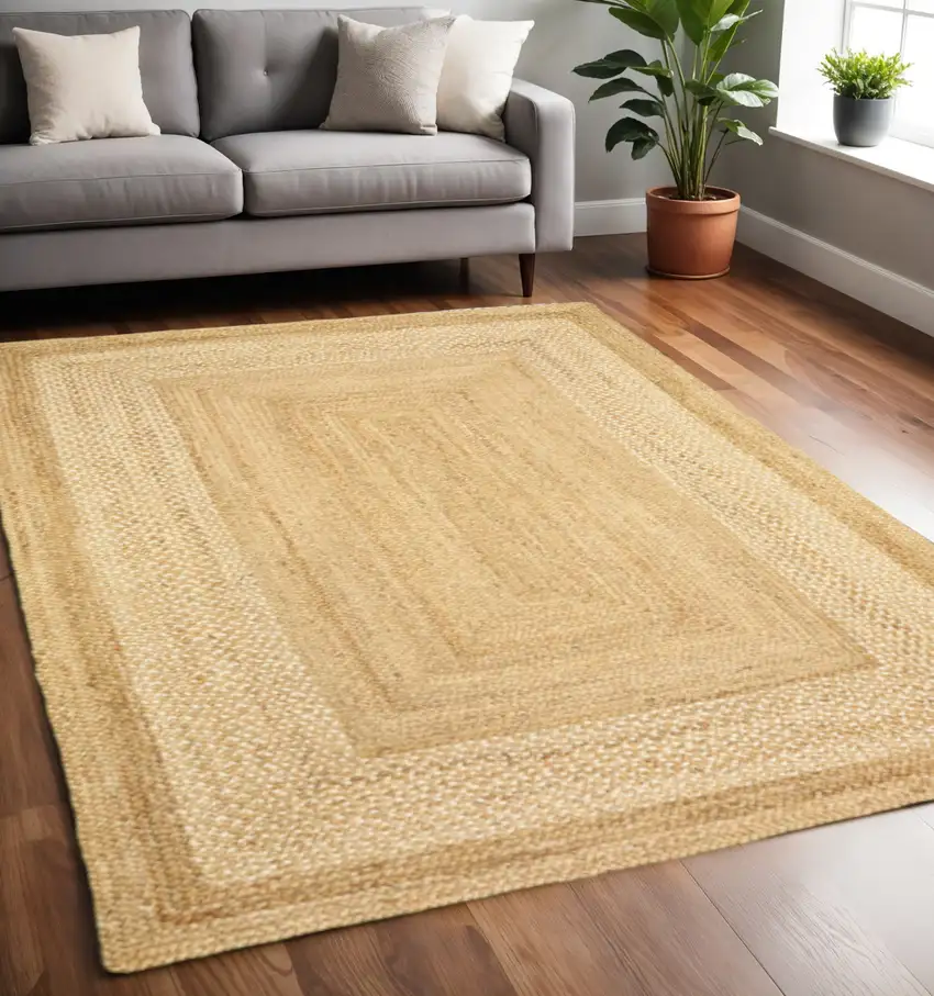 Classic Tan Bordered Area Rug Photo 1
