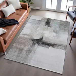 Photo of Coffee Charcoal And Ivory Abstract Washable Area Rug With UV Protection