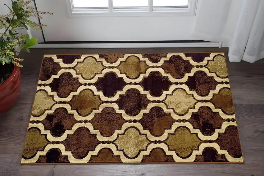 Coffee Beige And Black Quatrefoil Distressed Area Rug Photo 1