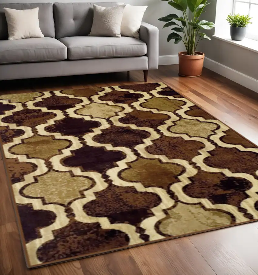 Coffee Beige And Black Quatrefoil Distressed Area Rug Photo 1