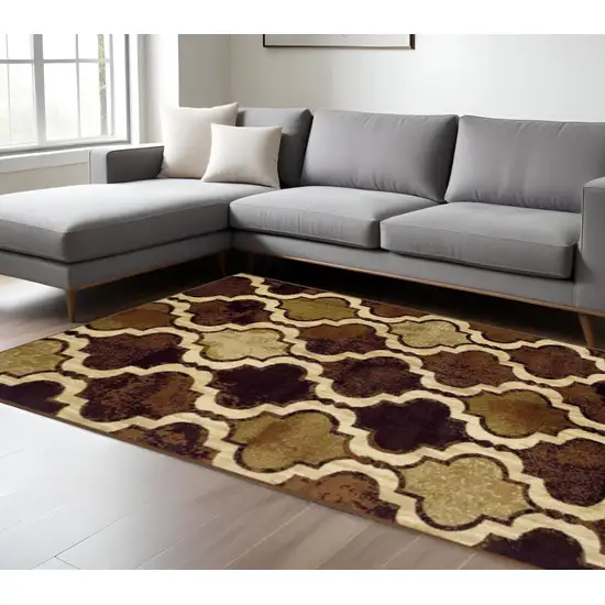 Coffee Beige And Black Quatrefoil Distressed Area Rug Photo 1