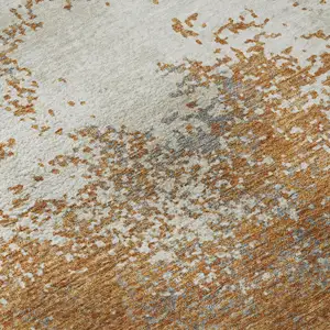 Photo of Copper And Beige Abstract Washable Area Rug With UV Protection