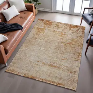 Photo of Copper And Beige Abstract Washable Area Rug With UV Protection