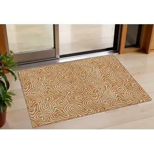 Photo of Copper And Beige Abstract Washable Indoor Outdoor Area Rug