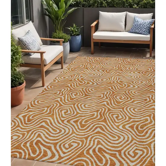Copper And Beige Abstract Washable Indoor Outdoor Area Rug Photo 1