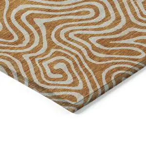 Photo of Copper And Beige Abstract Washable Indoor Outdoor Area Rug