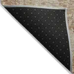 Photo of Copper And Beige Abstract Washable Indoor Outdoor Area Rug