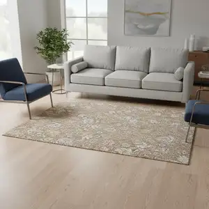 Photo of Copper And Beige Floral Washable Area Rug With UV Protection