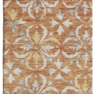 Photo of Copper And Beige Floral Washable Area Rug With UV Protection