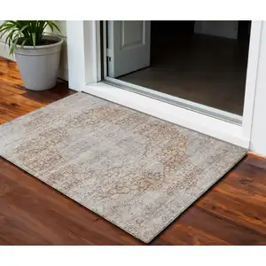 Photo of Copper And Beige Floral Washable Indoor Outdoor Area Rug
