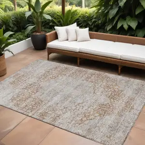 Photo of Copper And Beige Floral Washable Indoor Outdoor Area Rug