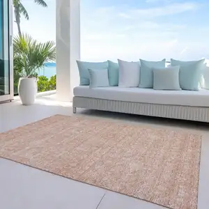 Photo of Copper And Beige Floral Washable Indoor Outdoor Area Rug