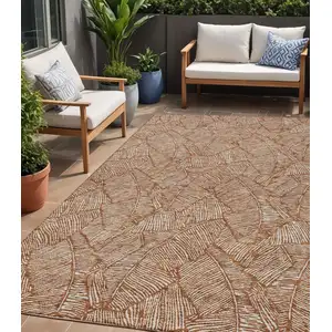 Photo of Copper And Beige Floral Washable Indoor Outdoor Area Rug