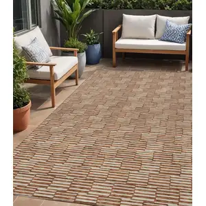 Photo of Copper And Beige Geometric Washable Indoor Outdoor Area Rug