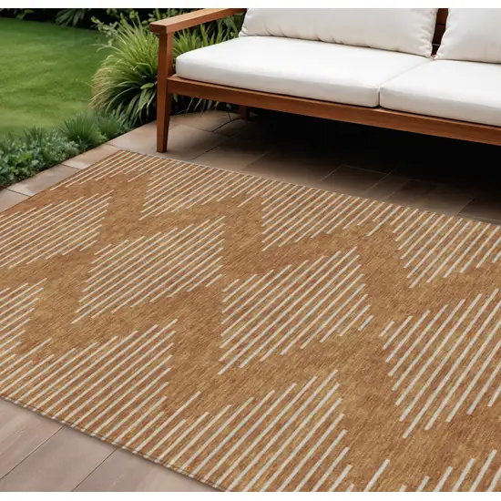 Copper And Beige Geometric Washable Indoor Outdoor Area Rug Photo 1