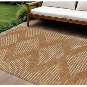Photo of Copper And Beige Geometric Washable Indoor Outdoor Area Rug
