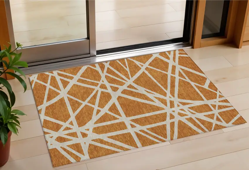 Copper And Beige Geometric Washable Indoor Outdoor Area Rug Photo 1