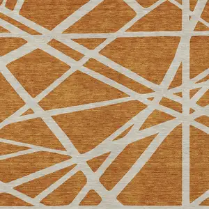 Photo of Copper And Beige Geometric Washable Indoor Outdoor Area Rug
