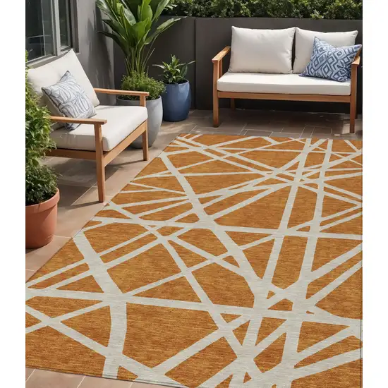 Copper And Beige Geometric Washable Indoor Outdoor Area Rug Photo 1