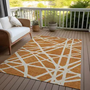 Photo of Copper And Beige Geometric Washable Indoor Outdoor Area Rug