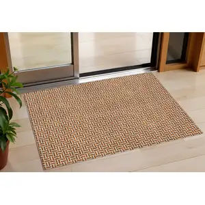 Photo of Copper And Beige Geometric Washable Indoor Outdoor Area Rug