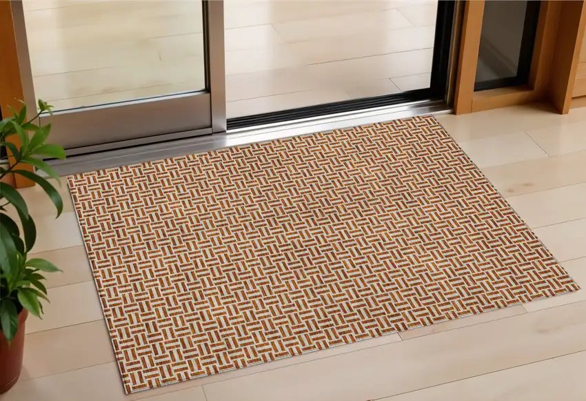 Copper And Beige Geometric Washable Indoor Outdoor Area Rug Photo 1