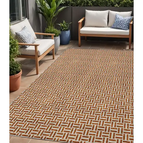Copper And Beige Geometric Washable Indoor Outdoor Area Rug Photo 1