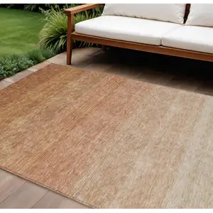 Photo of Copper And Beige Ombre Washable Indoor Outdoor Area Rug