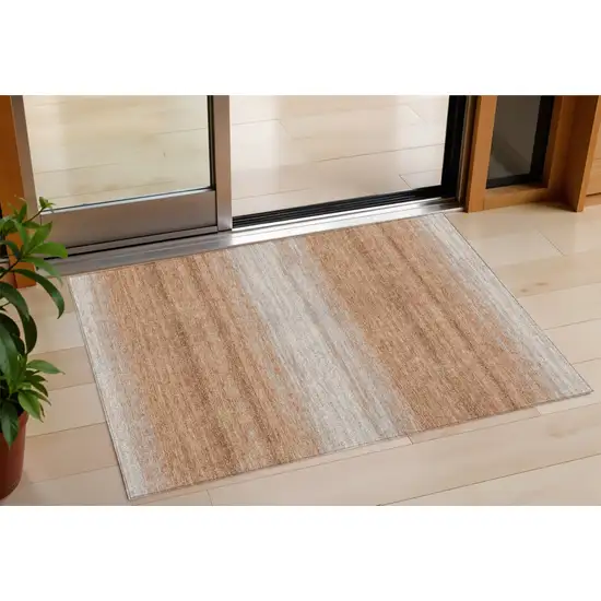 Copper And Beige Striped Washable Indoor Outdoor Area Rug Photo 1